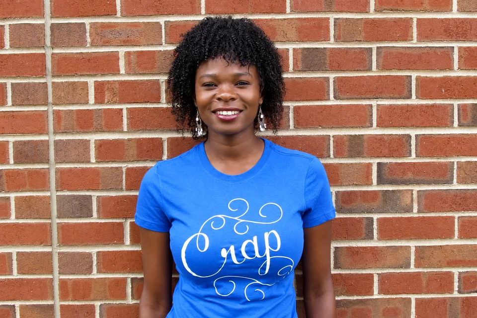 Blue T-shirt with white ornamental Crap lettering