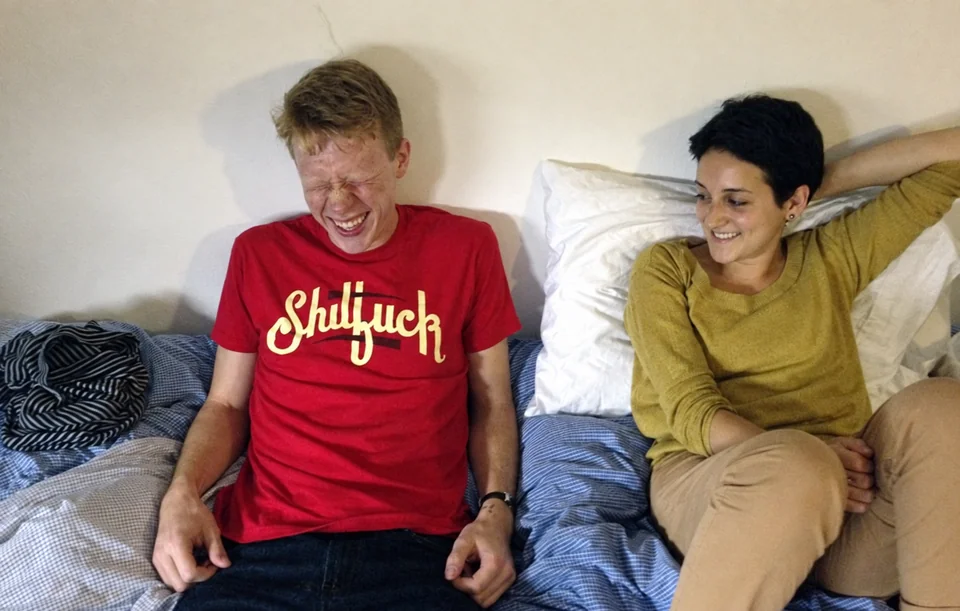 Red T-shirt with cream script lettering